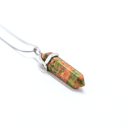 Side view of Vision crystal Unakite bullet point pendant.