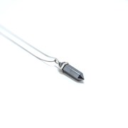 long range shot of grounding crystal hematite with high quality stainless steel chain