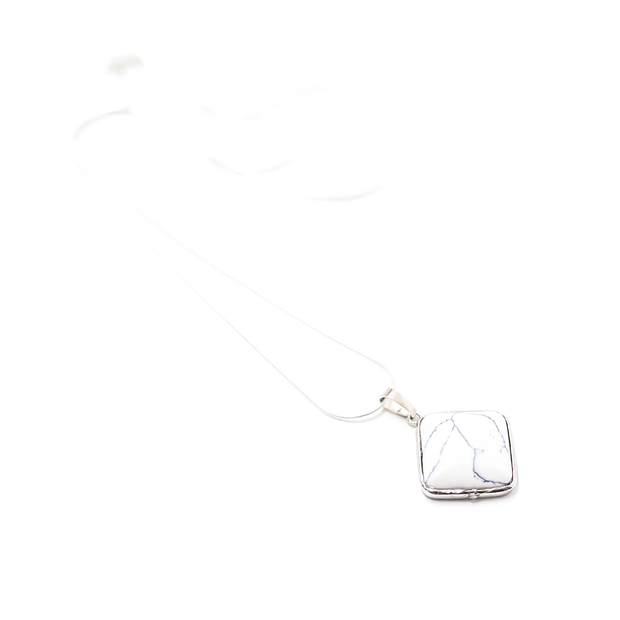 White Natural Crystal Howlite prism pendant necklace with silver tone stainless steel snake chain.