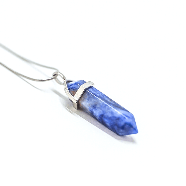 Close up side view of Emotional Balance point  natural crystal Sodalite.