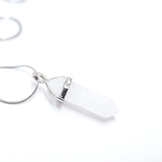 High quality Stainless Steel snake chain with natural clear quartz bullet point pendant.