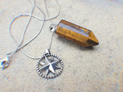Confidence tiger's eye natural crystal pendant and silver compass star chain with stainless steel snake chain.