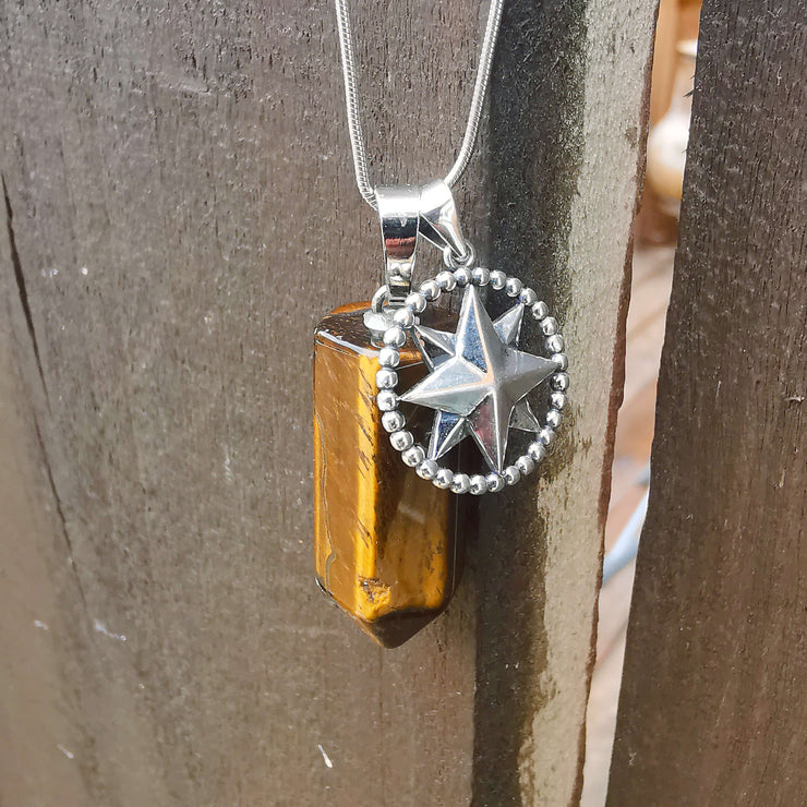Tiger's Eye bullet pendant necklace with compass charm and steel snake chain.