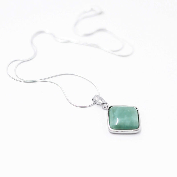Side view of Green Aventurine Bullet point pendant with silver tone chain.