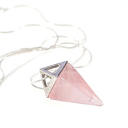 Close up of Pink Love crystal Rose Quartz pyramid with high quality stainless steel snake chain.