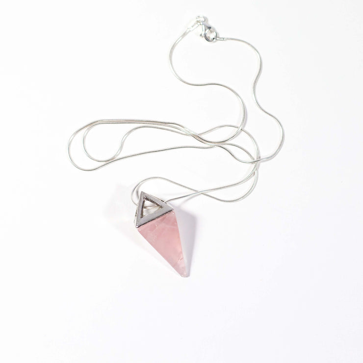 Over head view of Rose quartz pyramid pendant with stainless steel snake chain.