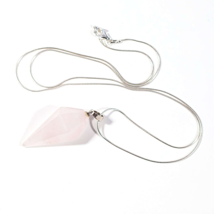 rose quartz oval crystal pendant with snake chain.