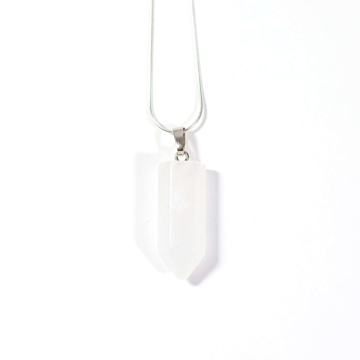 Head on view of Clear Quartz natural crystal bullet point pendant with steel chain.