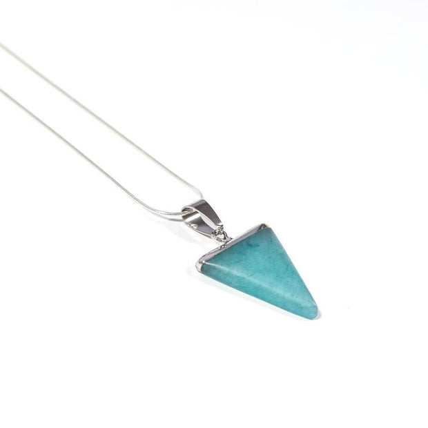 Close up of Amazonite natural crystal necklace. Triangle pendant with silver tone stainless steel snake chain.