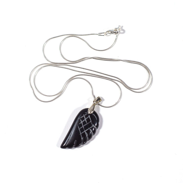 Head on view of Black Agate crystal pendant with stainless steel chain.