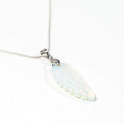 Opal Angel Wing necklace with silver tone stainless steel snake chain.