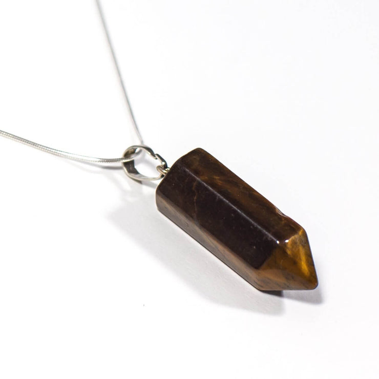 Close up view of Golden Brown Tiger's Eye Bullet necklace with high quality silver tone stainless steel snake chain.