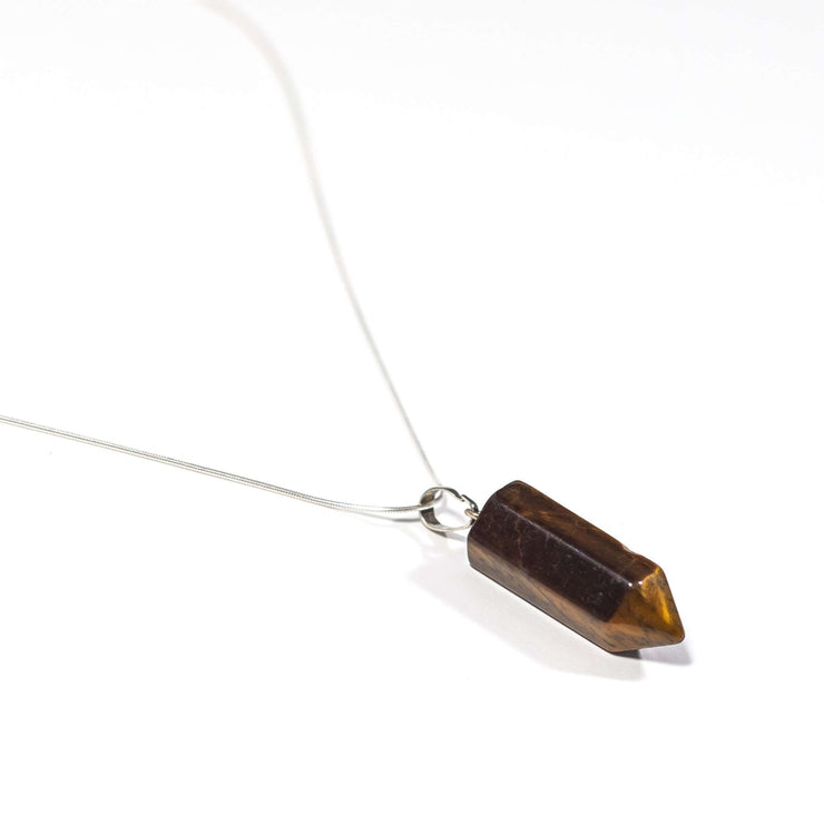 Tiger's Eye bullet crystal pendant with snake chain.
