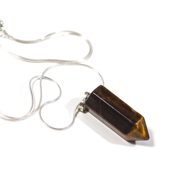 Natural confidence crystal Tiger's Eye bullet point pendant with snake chain.