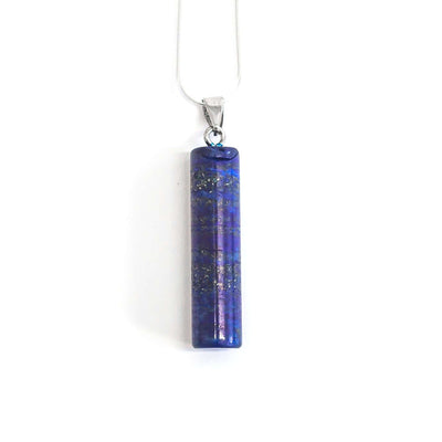 Natural Royal blue lapis lazuli column crystal pendant with silver tone snake chain.