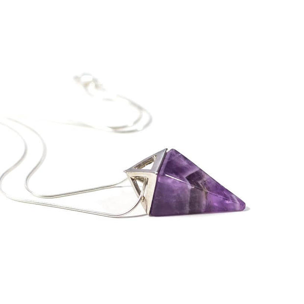 Side view of relaxing necklace amethyst pyramid with stainless steel snake chain.