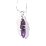 Dark purple Amethyst crystal pendant wrapped in silver tone stainless steel  with chain.