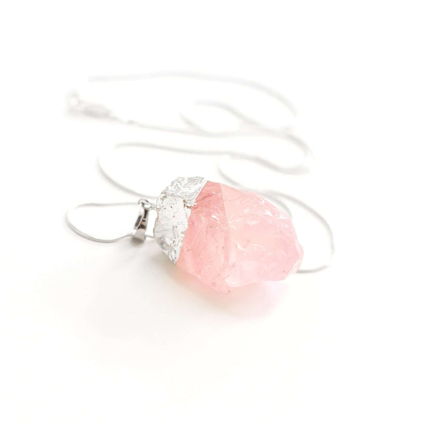 Rough cut natural Rose quartz crystal Love pendant  with stainless steel chain.