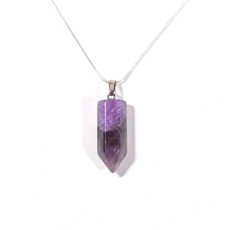 Head on view of purple coloured natural crystal Amethyst bullet pendant with stainless steel snake chain.
