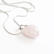 Natural Rose Quartz Love heart pendant with stainless steel snake chain.