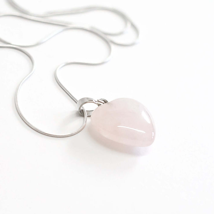 Natural Rose Quartz Love heart pendant with stainless steel snake chain.