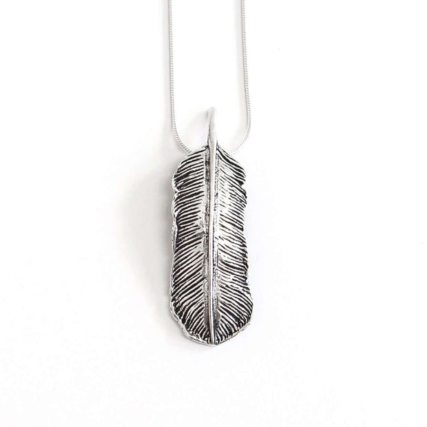 Head on view of Large Women's Sterling Silver Feather pendant necklace with 925 silver snake chain.