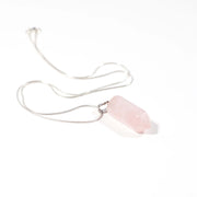 Rose quartz bullet point necklace with stainless steel snake chain.