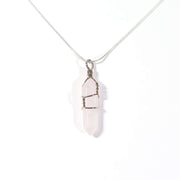 Head on view of Love Necklace Rose Quartz  wire wrapped bullet and chain.