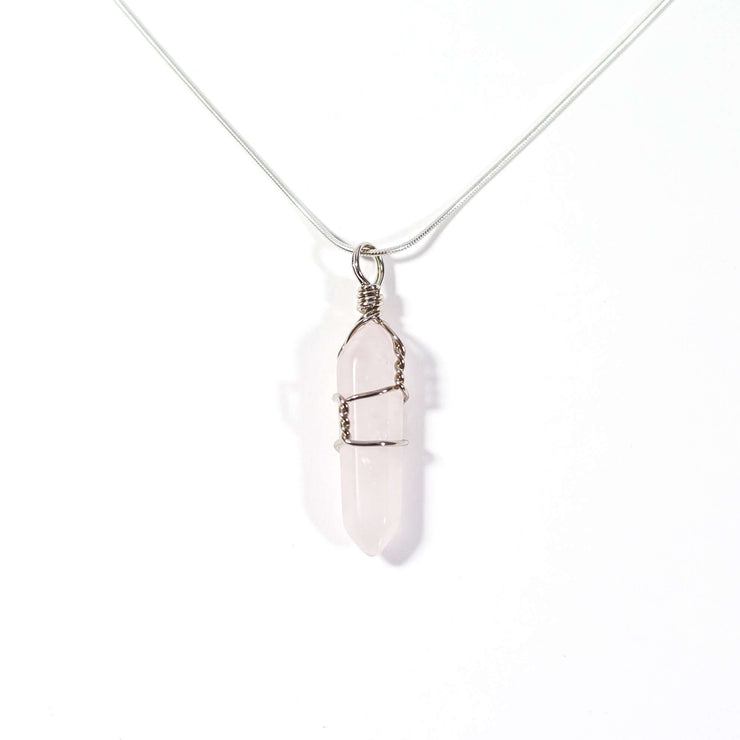 Head on view of Love Necklace Rose Quartz  wire wrapped bullet and chain.