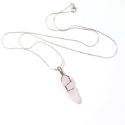 Natural Rose quartz crystal necklace. Wire wrapped pendant with high quality stainless steel snake chain.